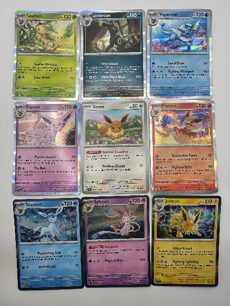 Pokémon bundel · 9 kaarten uit Prismatic Evolutions